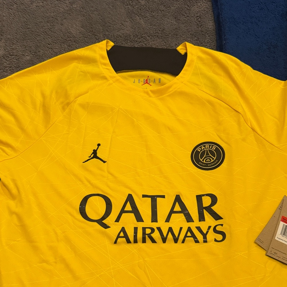 Jordan Paris Saint-Germain Yellow Soccer Jersey with Black Accents